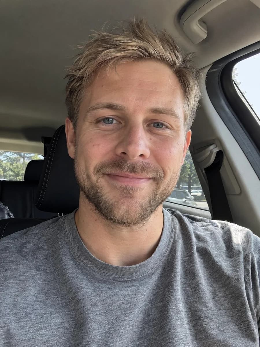 Uploaded selfie with two photos stacked behind it