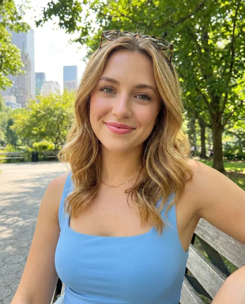 Illustrative profile of a woman on a park bench